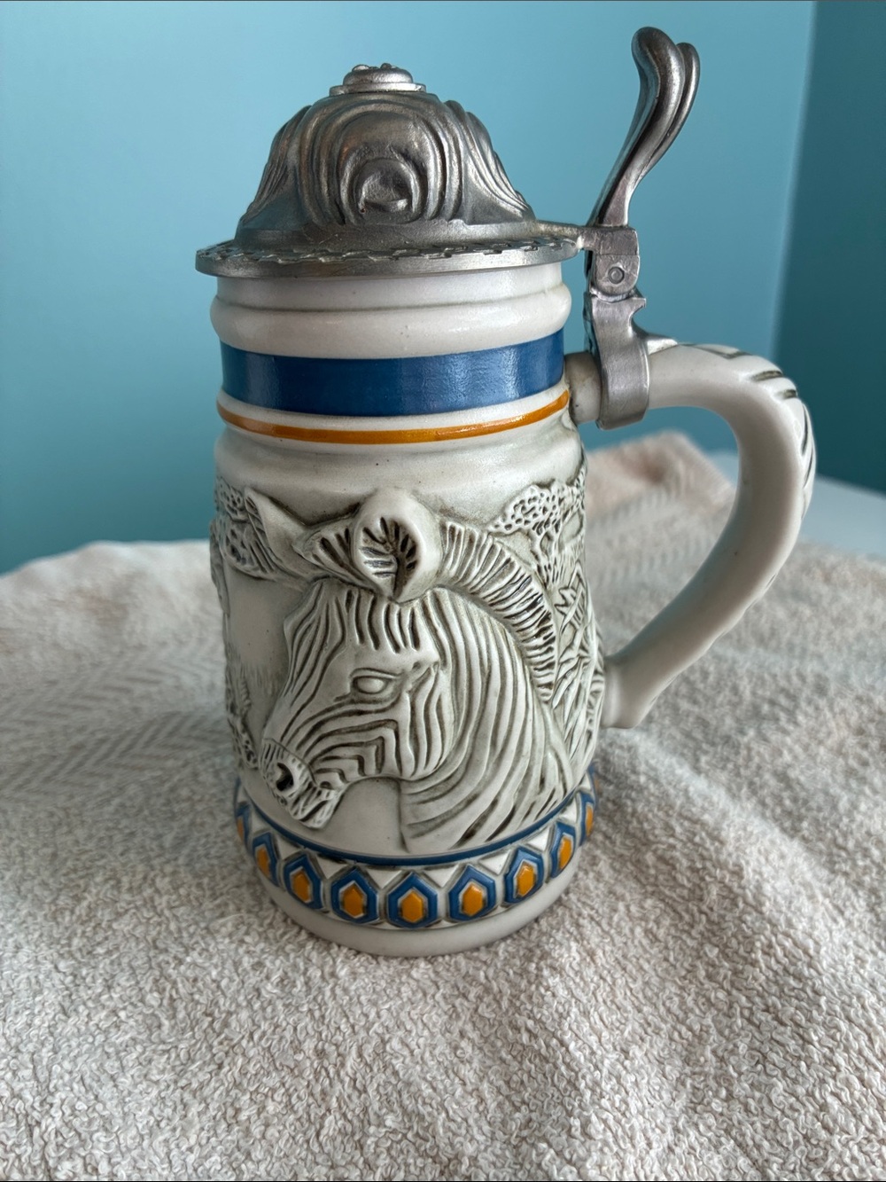 Avon Endangered Species Ceramic Zebra Relief Stein with Blue and Yellow Accents